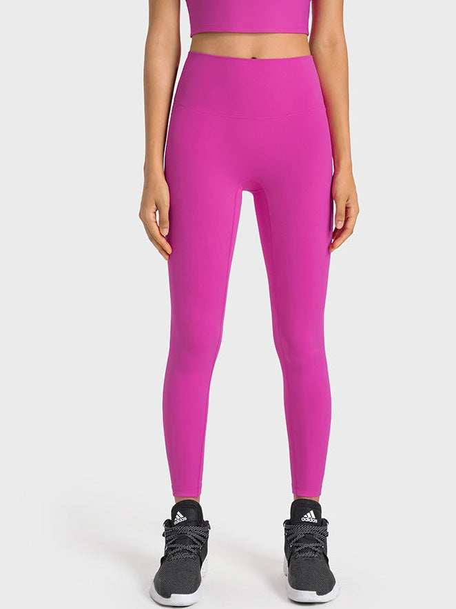 بنطال ضيق بخصر عالٍ وملمس عاري