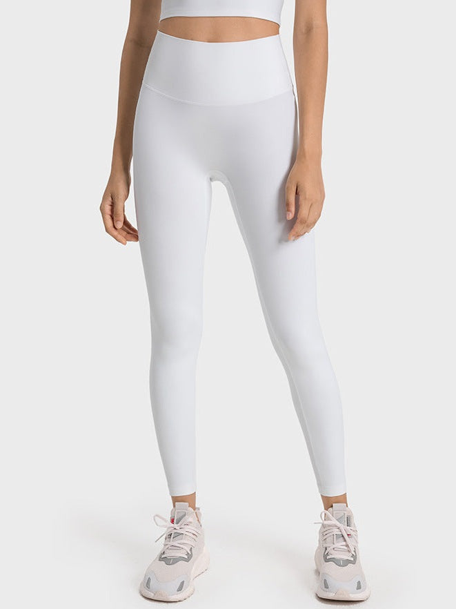 بنطال ضيق بخصر عالٍ وملمس عاري