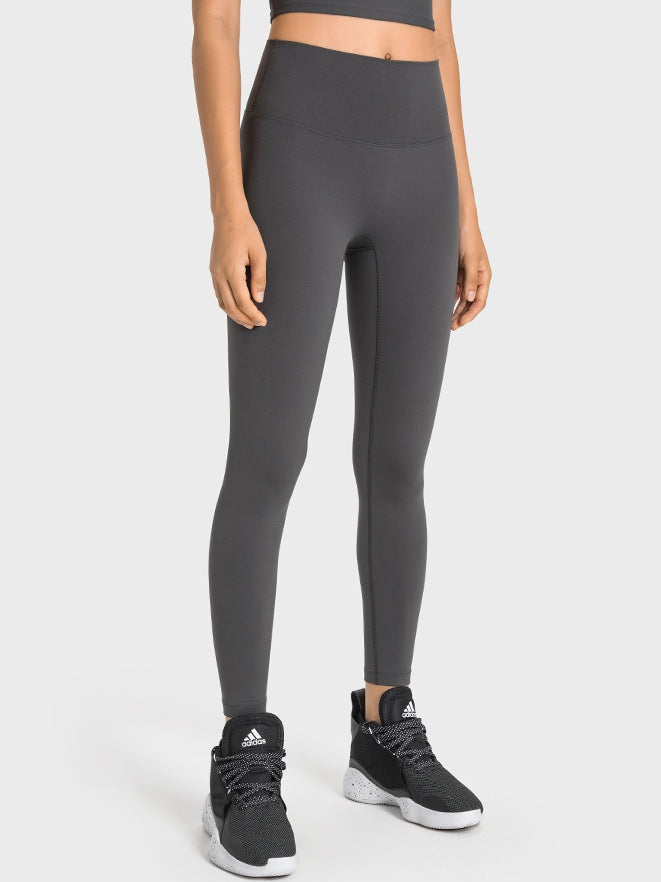 بنطال ضيق بخصر عالٍ وملمس عاري