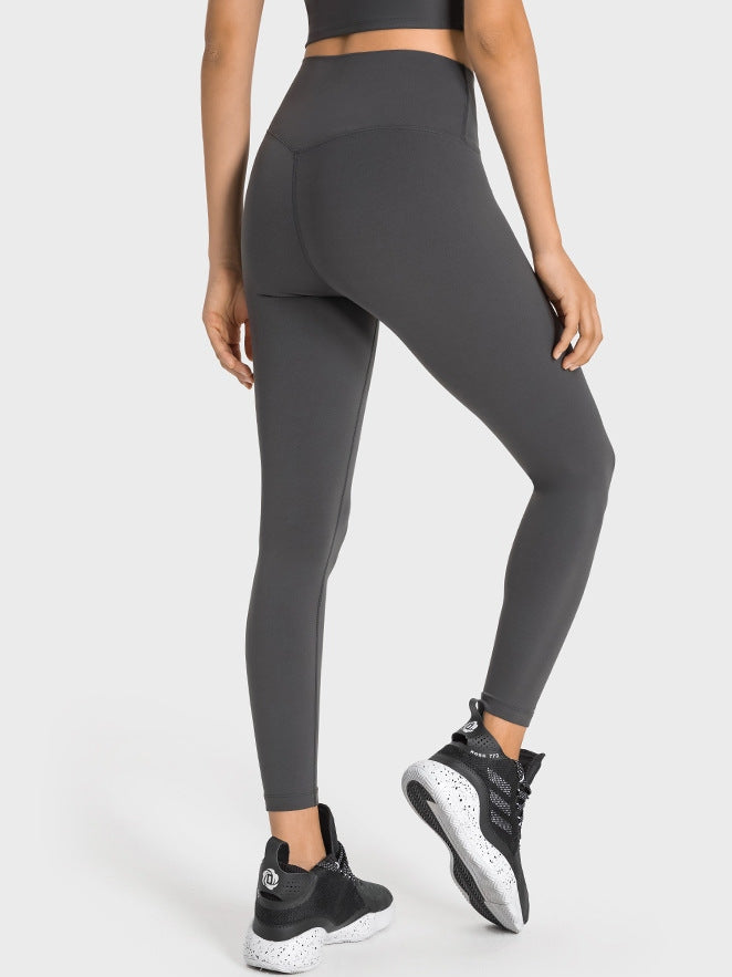 بنطال ضيق بخصر عالٍ وملمس عاري