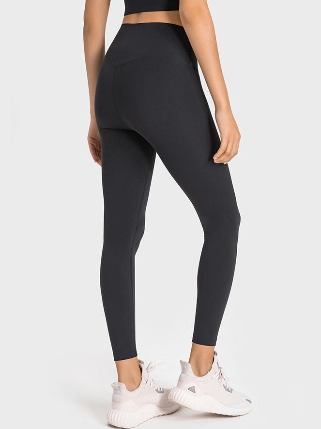 بنطال ضيق بخصر عالٍ وملمس عاري