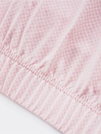 قميص بولو مع وسادة صدر