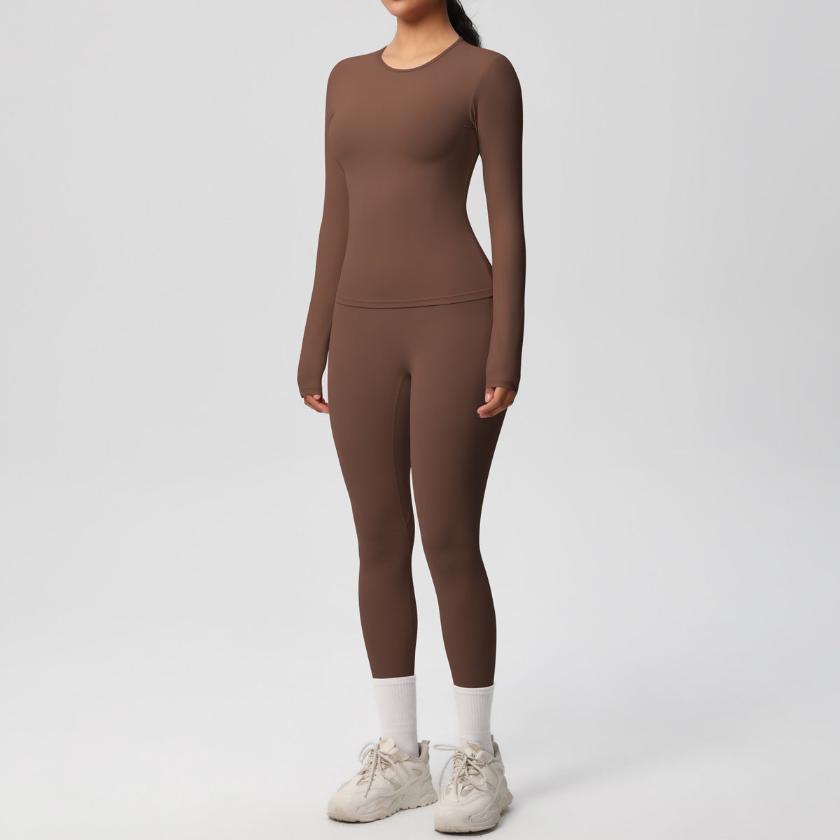 طقم يوغا بأكمام طويلة