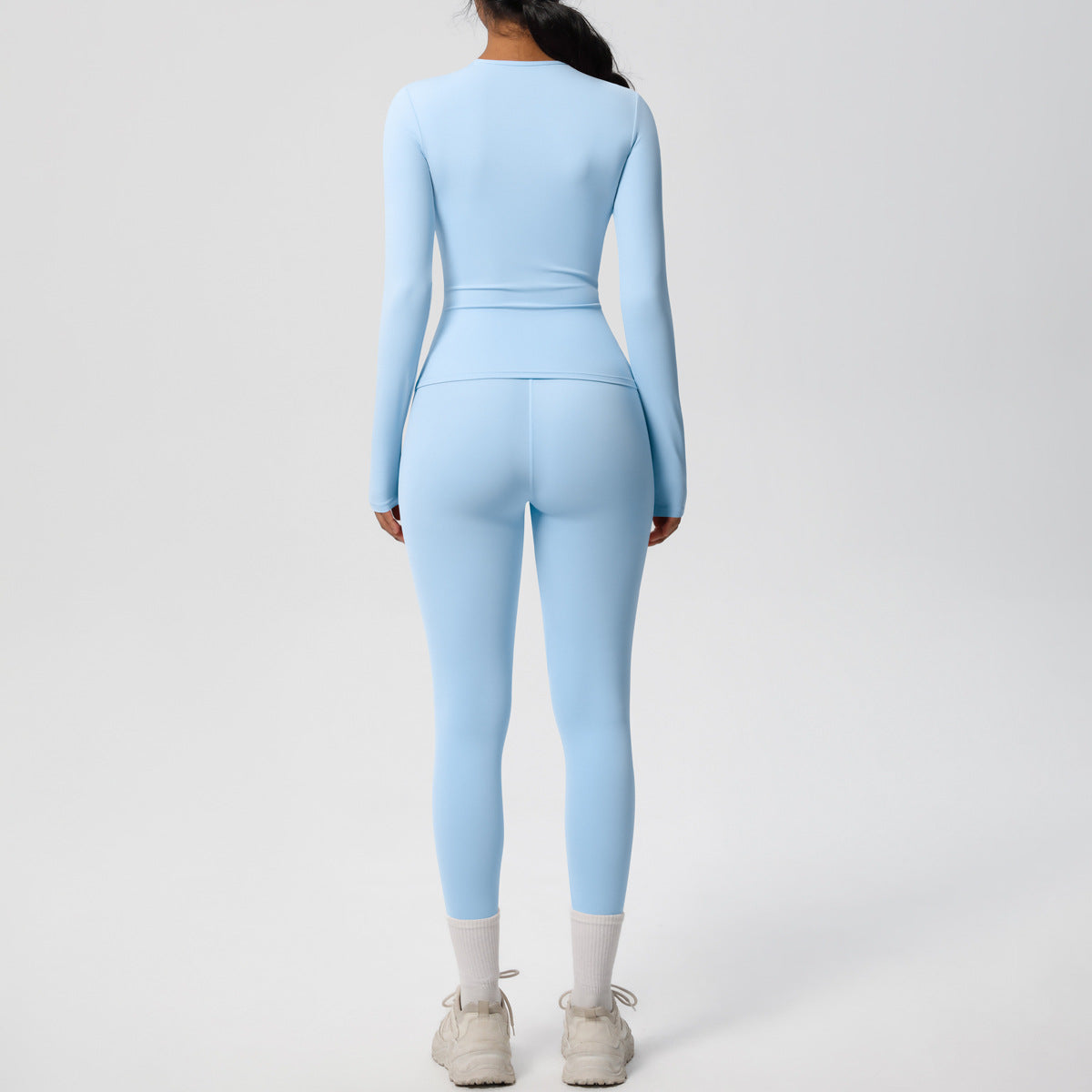 طقم يوغا بأكمام طويلة