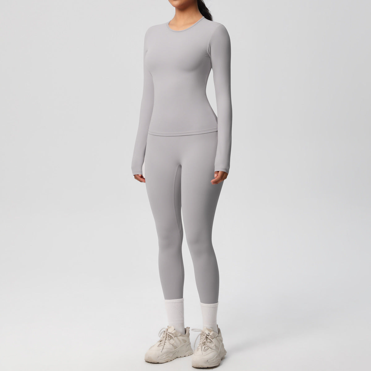 طقم يوغا بأكمام طويلة