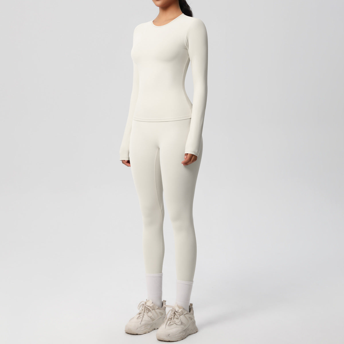 طقم يوغا بأكمام طويلة