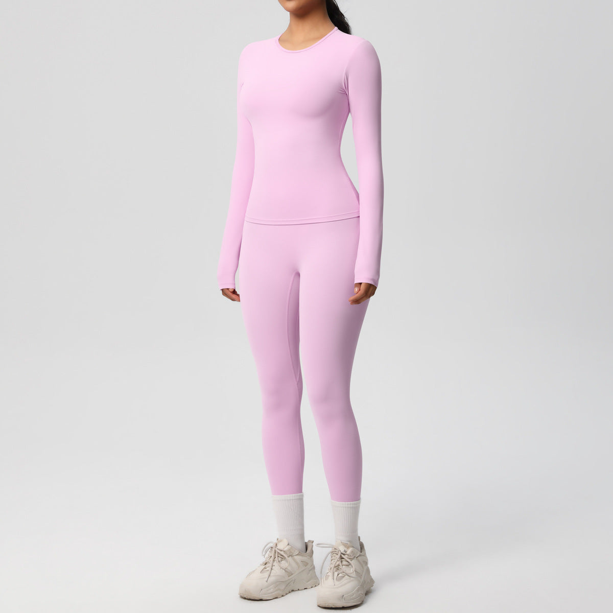 طقم يوغا بأكمام طويلة