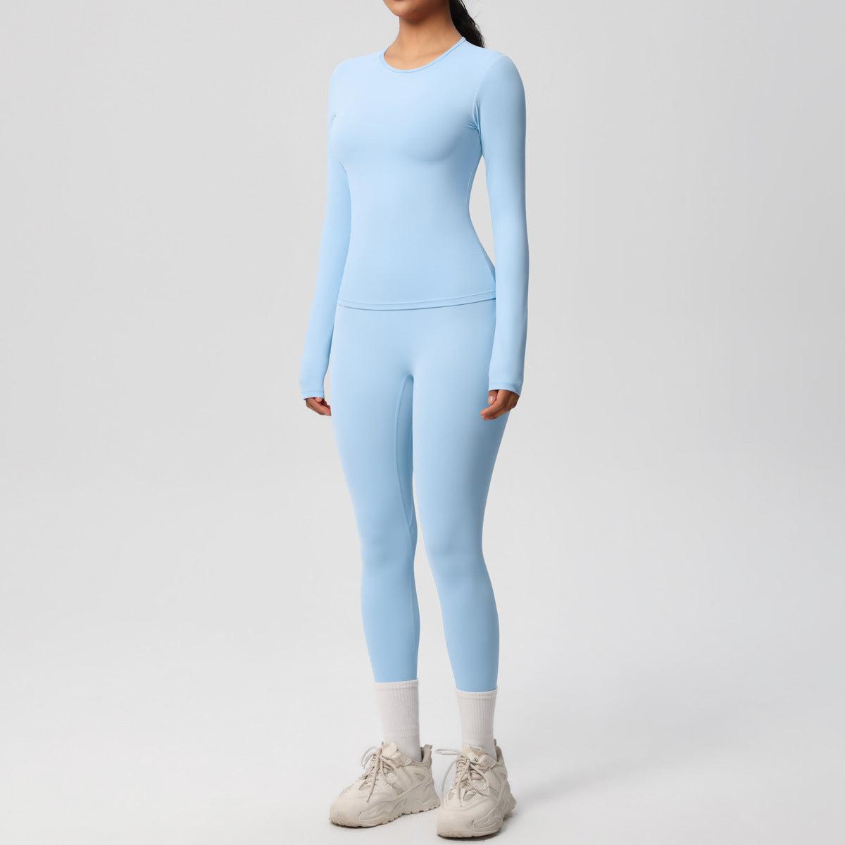 طقم يوغا بأكمام طويلة