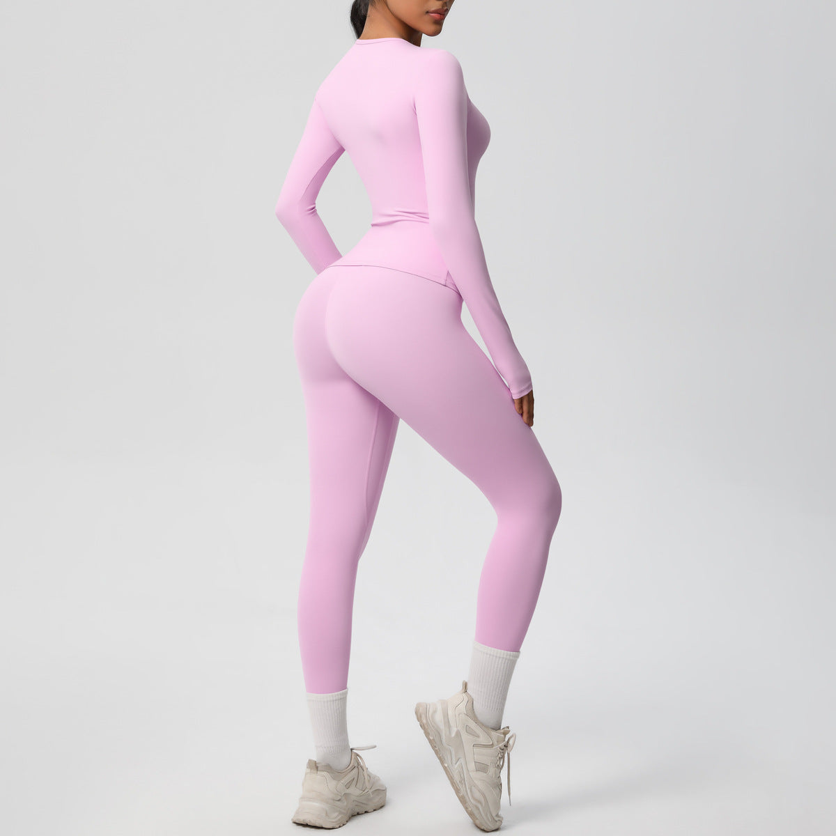 طقم يوغا بأكمام طويلة