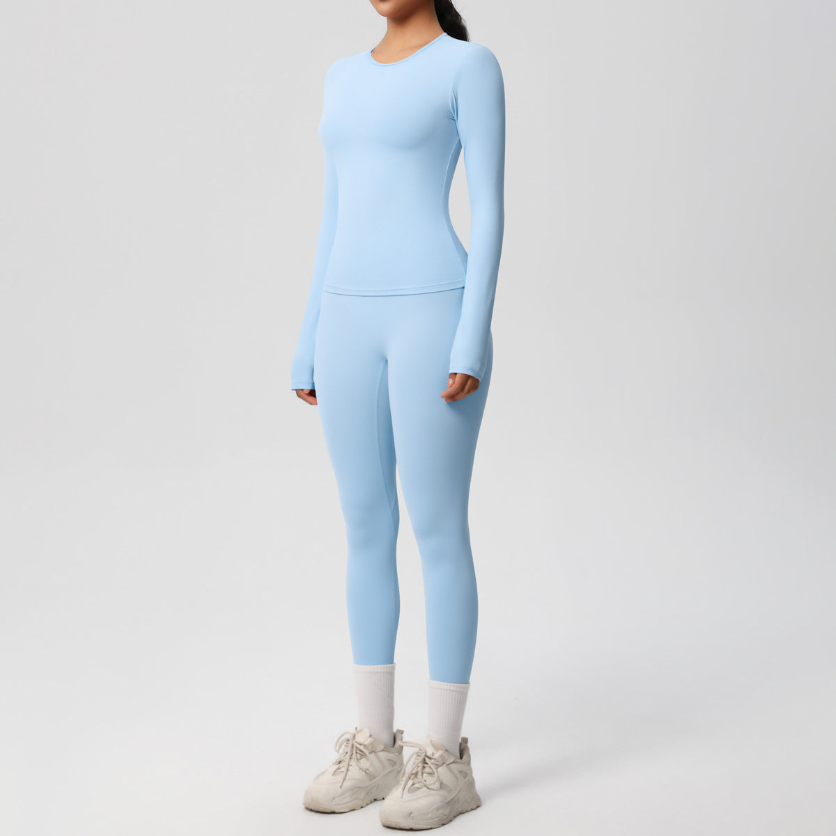 طقم يوغا بأكمام طويلة