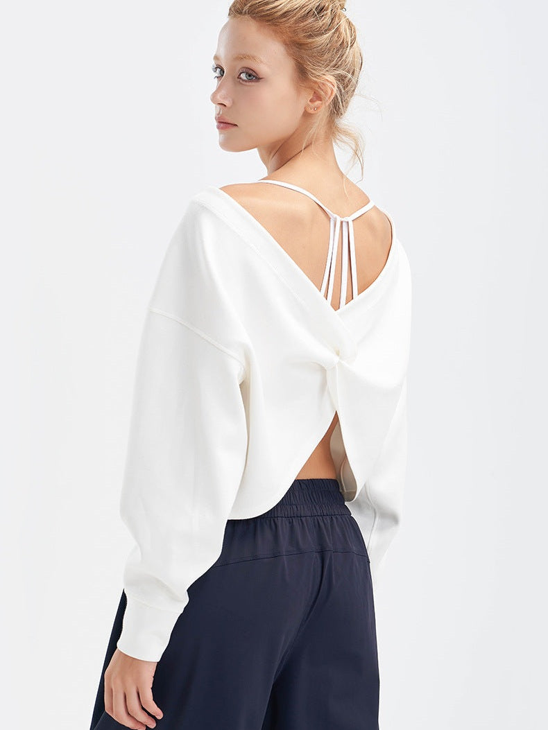 بلوزة ملتوية قصيرة بأكمام طويلة