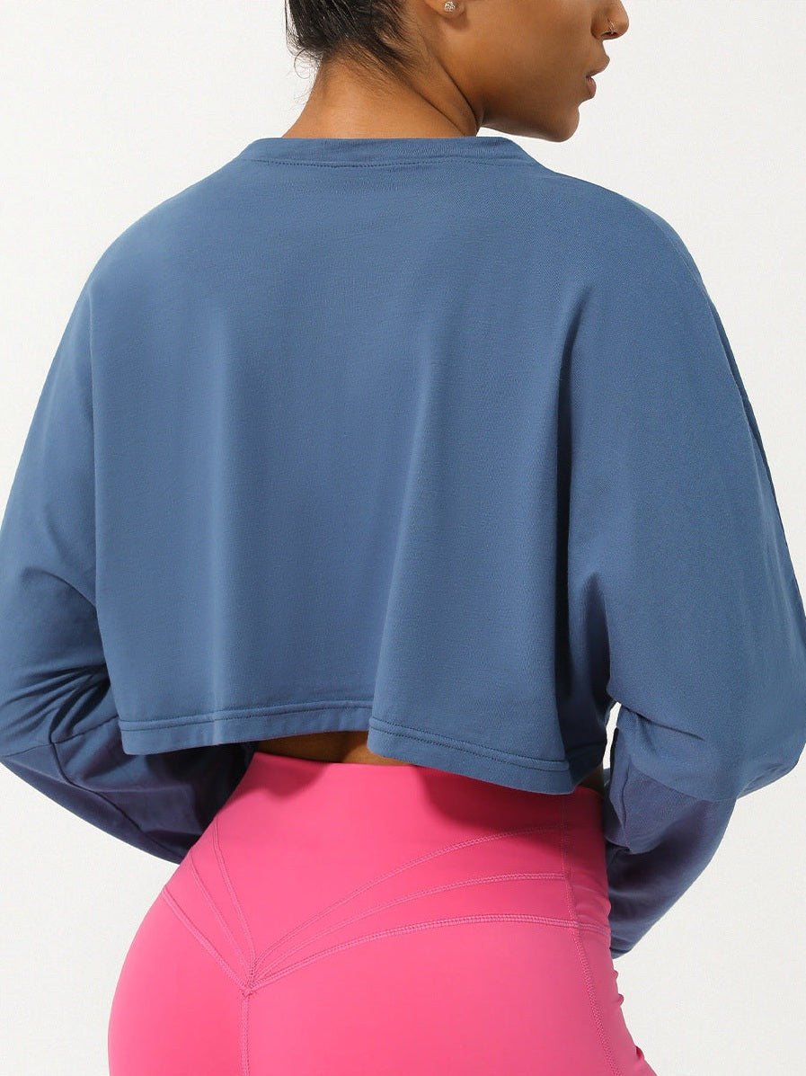 تي شيرت برقبة دائرية وأكمام طويلة