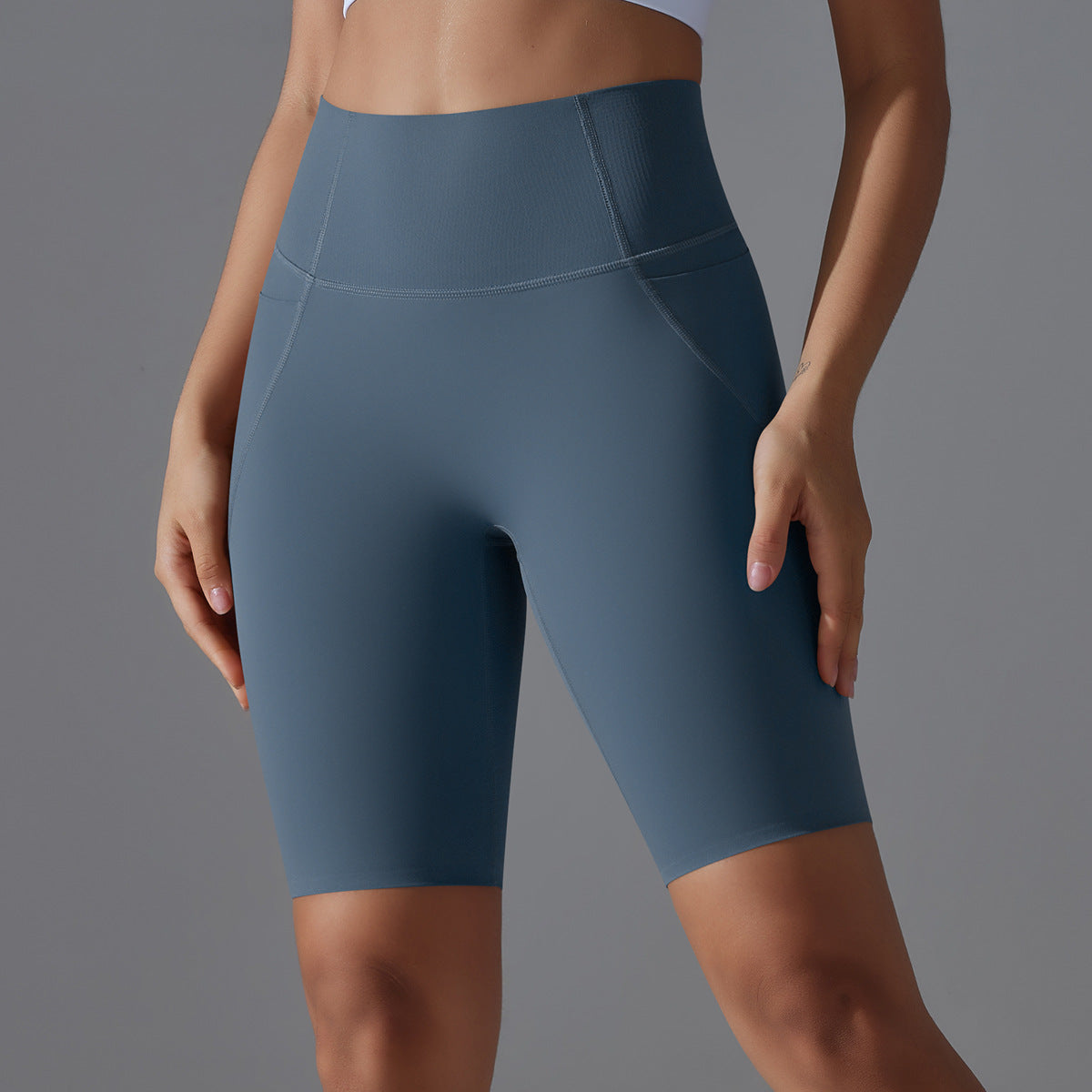 بنطال ضيق عالي الخصر بدون درزات وجيوب