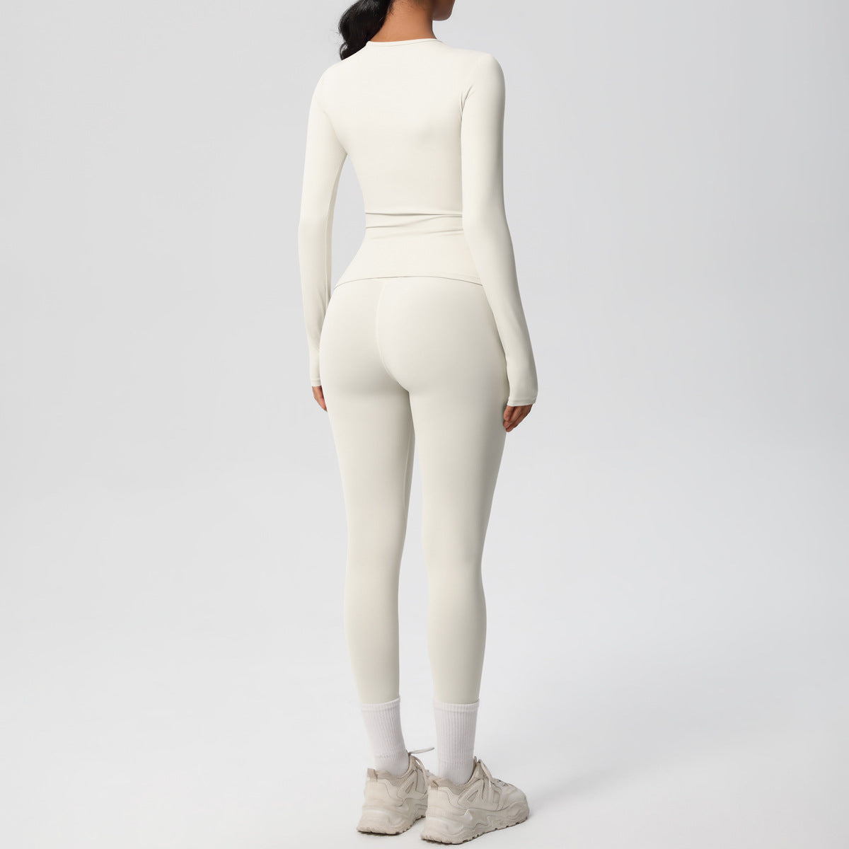 طقم يوغا بأكمام طويلة