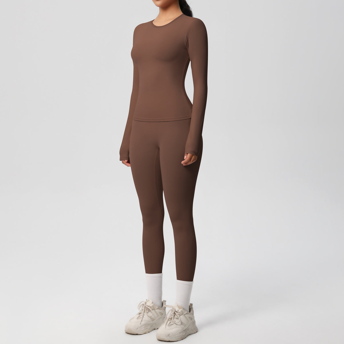 طقم يوغا بأكمام طويلة