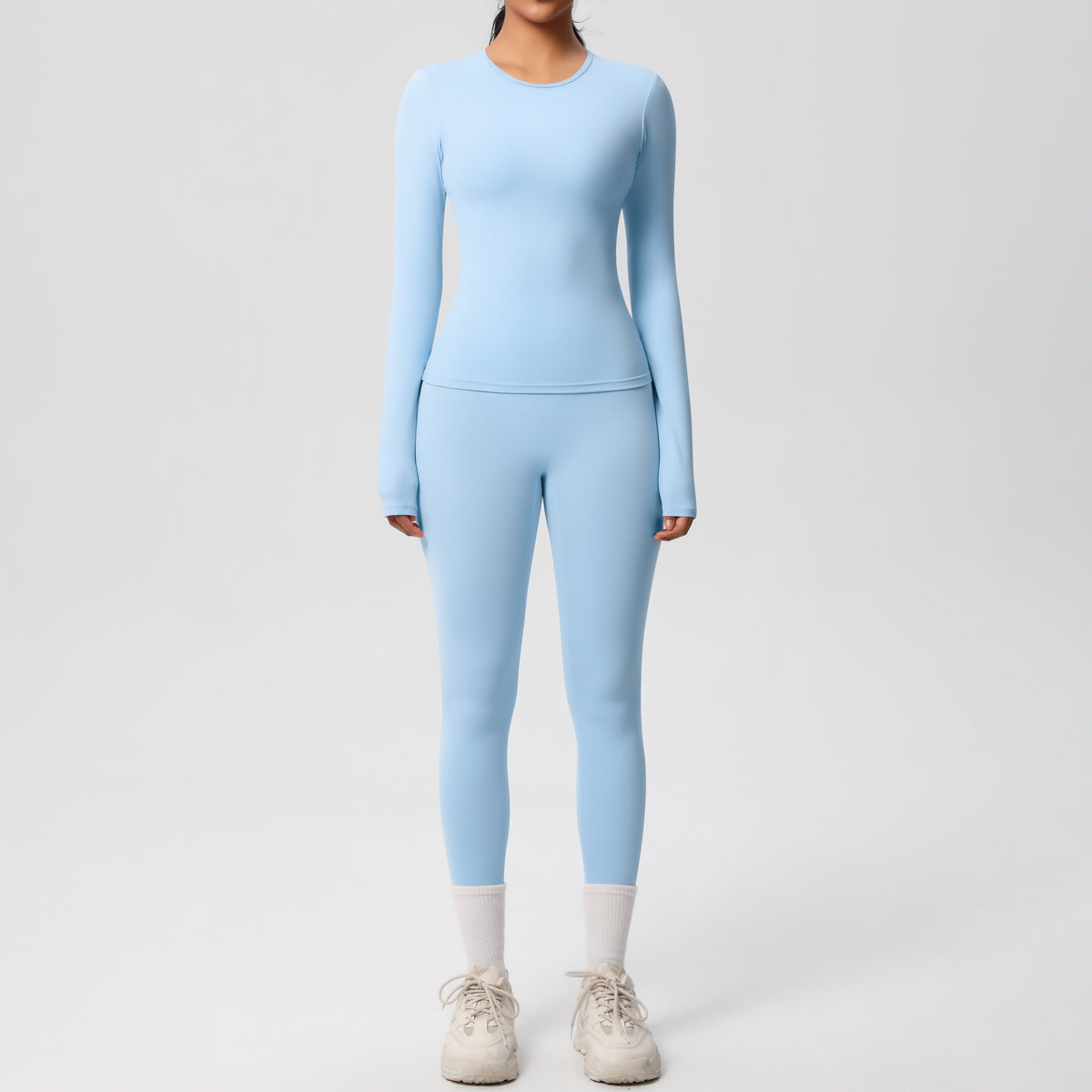 طقم يوغا بأكمام طويلة