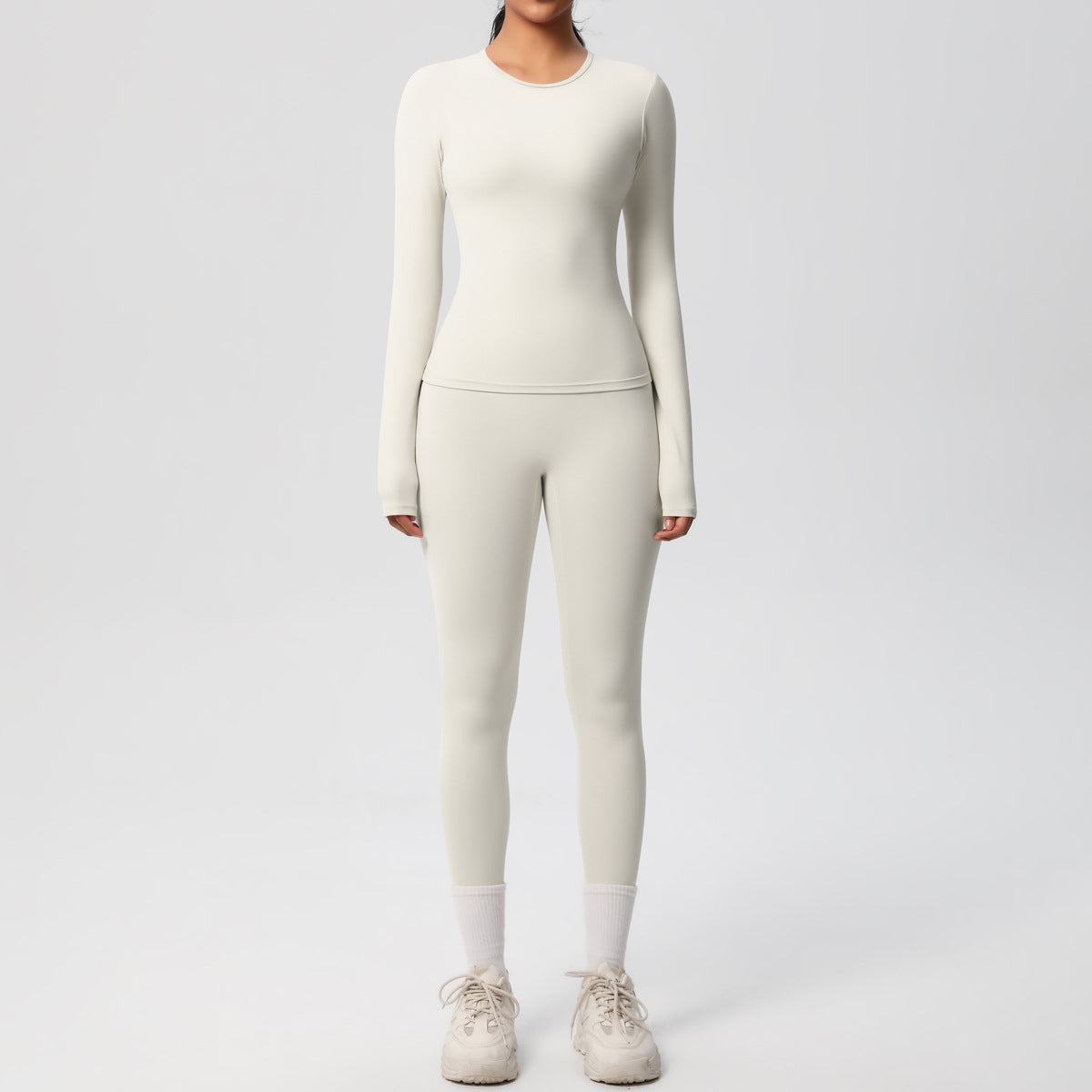 طقم يوغا بأكمام طويلة